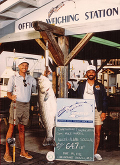 Captain Mike Harris (above right) shown with the former State record trophy rockfish 
